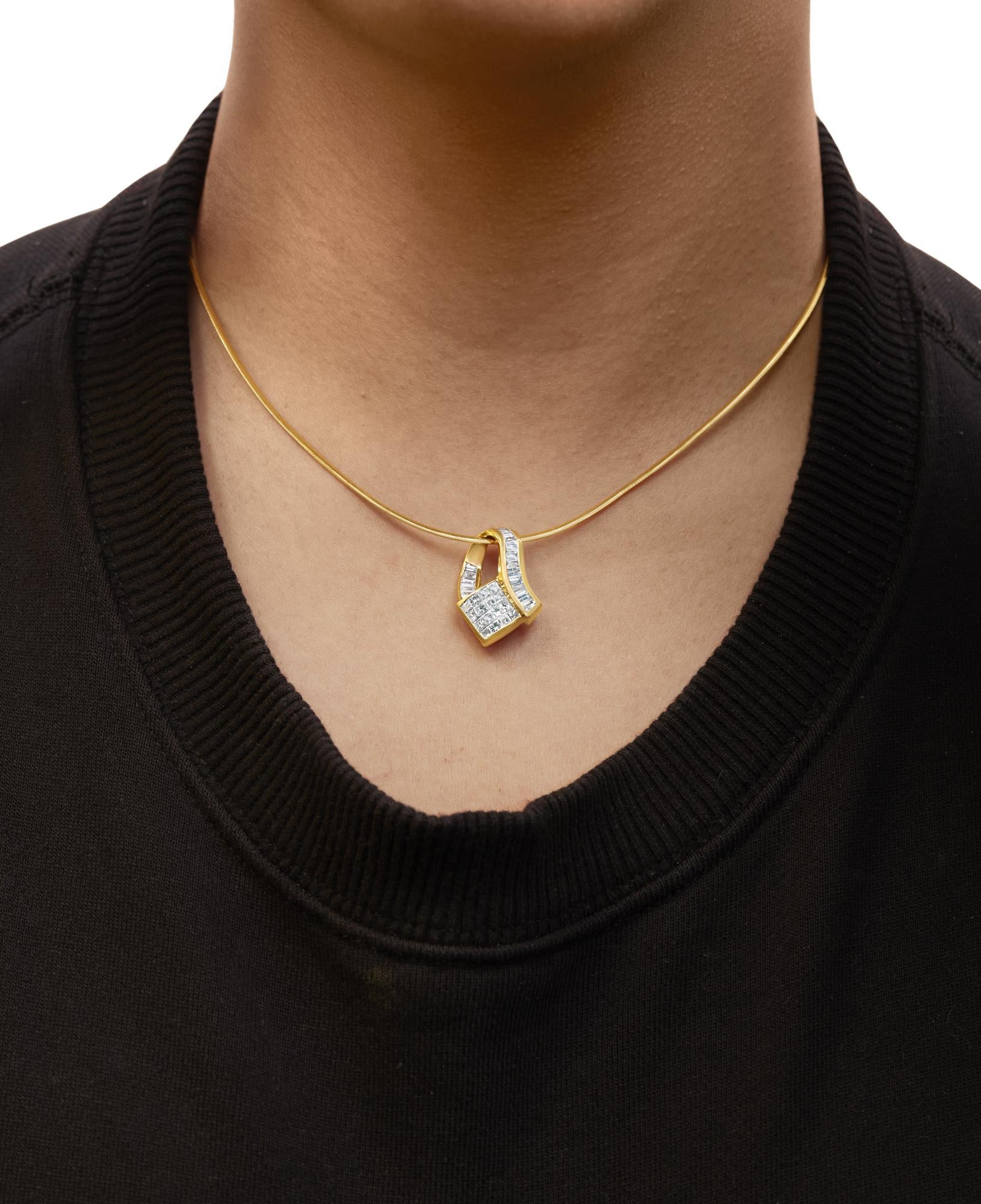 Close-up front view of a necklace worn on a model featuring a yellow metal chain with a pendant that has white baguette-shaped gemstones in channel setting and white princess-shaped gemstones in invisible setting.