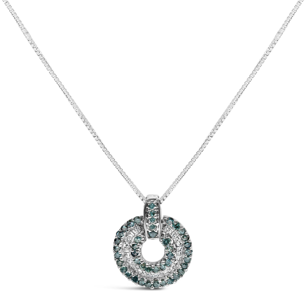 Front view of a white necklace with a circular pendant featuring two rows of blue round gemstones with prong settings surrounding inner rows of white baguette gemstones with channel settings.