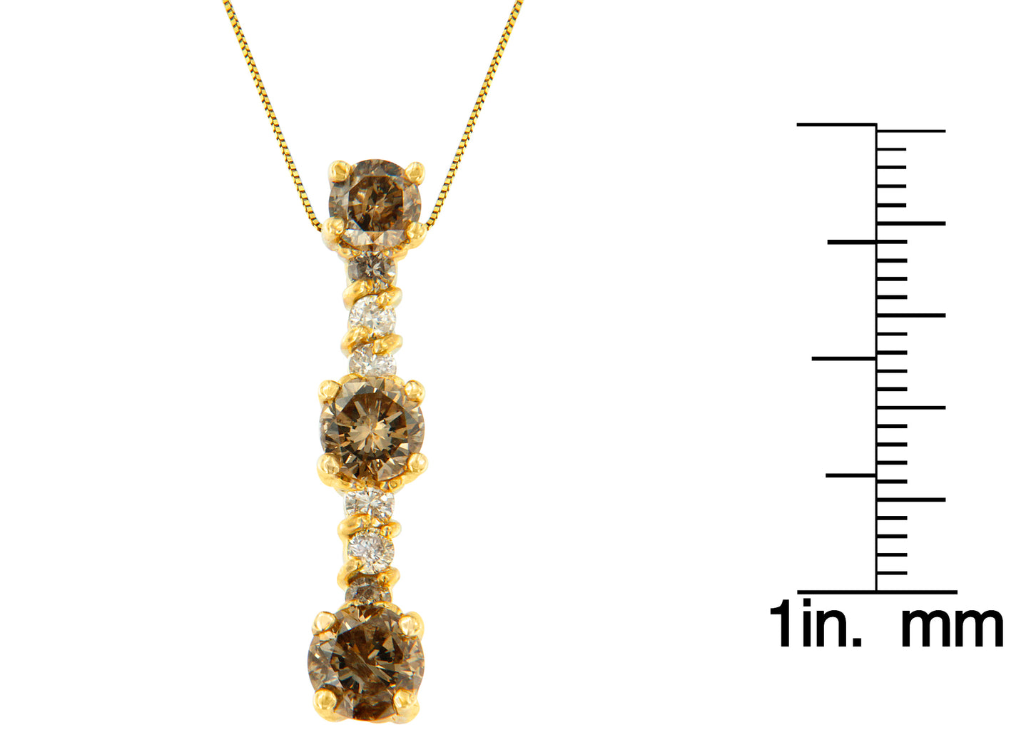 Front view of a yellow metal necklace with a vertical pendant featuring alternating round champagne and white gemstones in prong settings, shown next to a ruler for size reference.