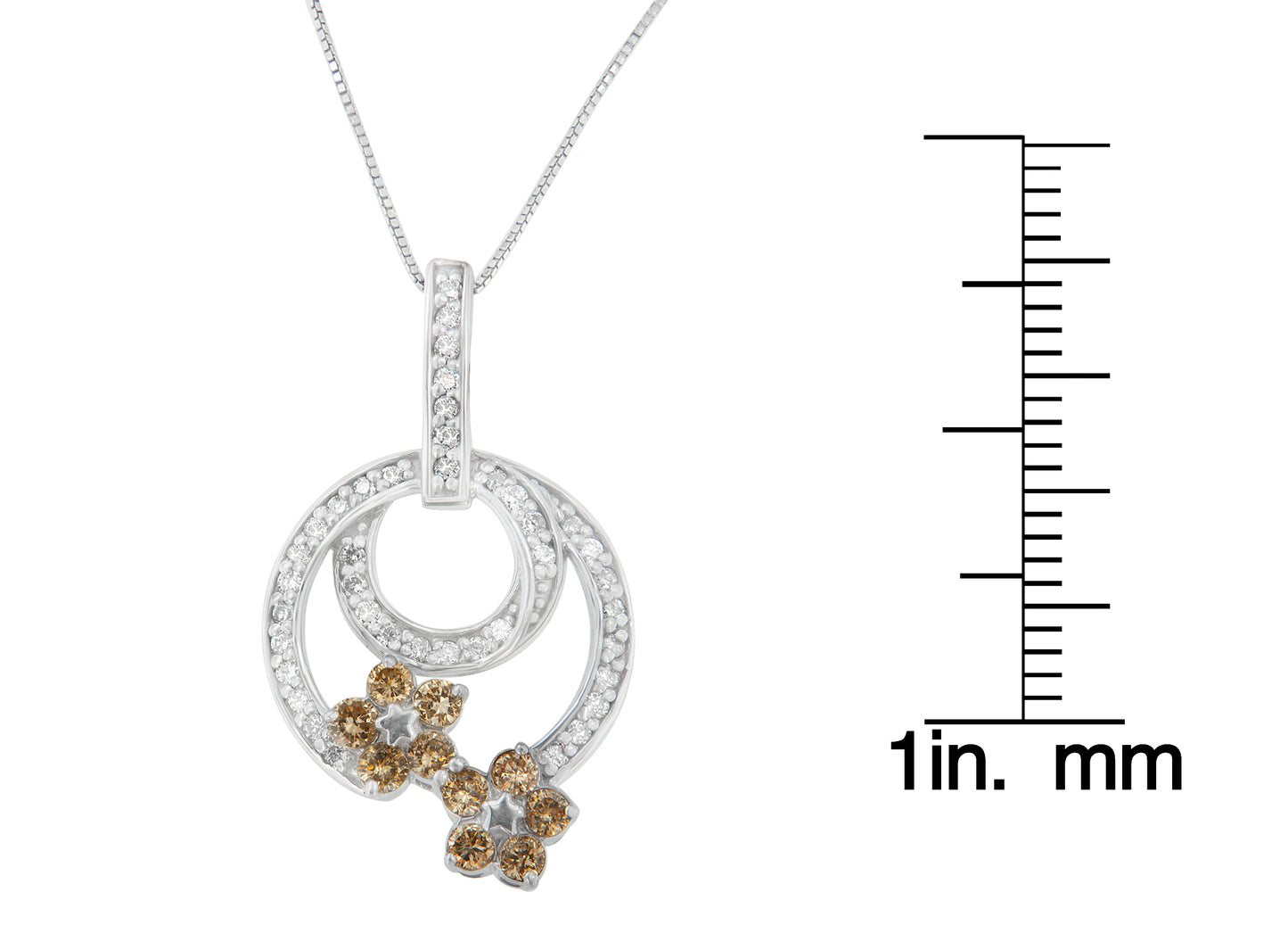 White metal necklace pendant with two overlapping circular designs set with round white gemstones, accented by two flower shapes with round champagne gemstones, shown hanging from a chain with a scale for size reference, front-facing angle.