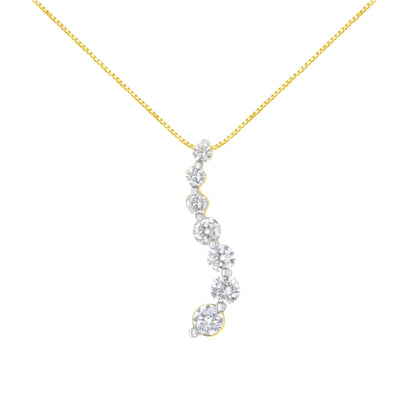 Front view of a yellow metal necklace with a pendant featuring a curved row of white round gemstones in prong settings.
