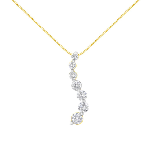 Front view of a yellow metal necklace with a pendant featuring a curved row of white round gemstones in prong settings.