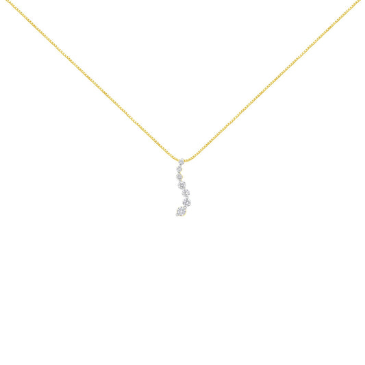 Front-facing shot of a yellow metal necklace with a vertical pendant featuring round white gemstones in prong settings.