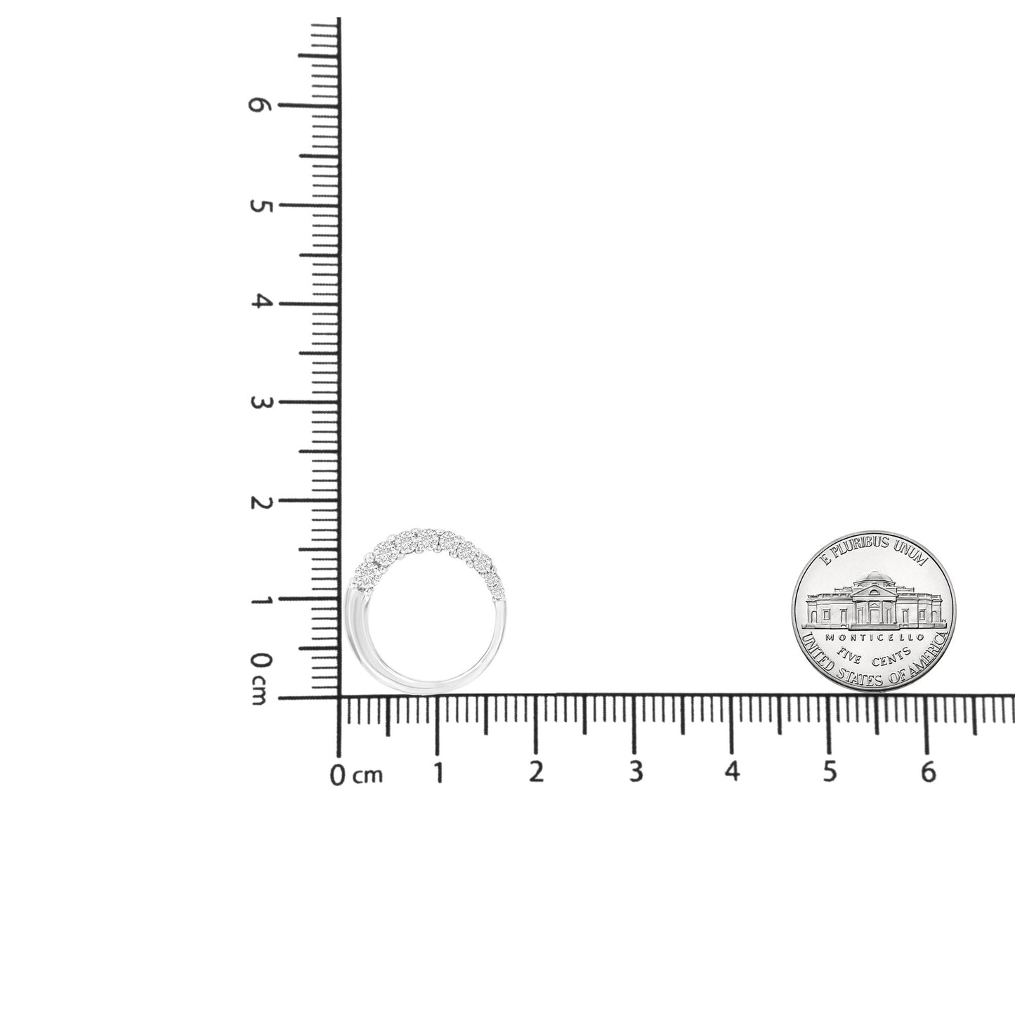 White metal necklace with nine round white gemstones in prong settings, shown from the front on a ruler for size reference.