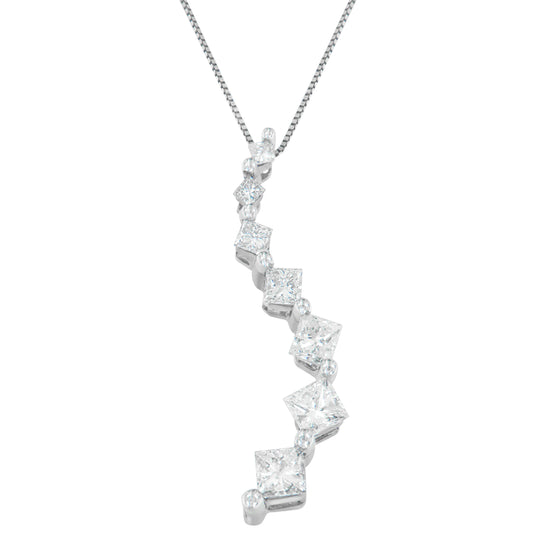 White metal necklace with a vertically aligned pendant featuring princess shape white gemstones in prong settings, photographed from the front on a white background.