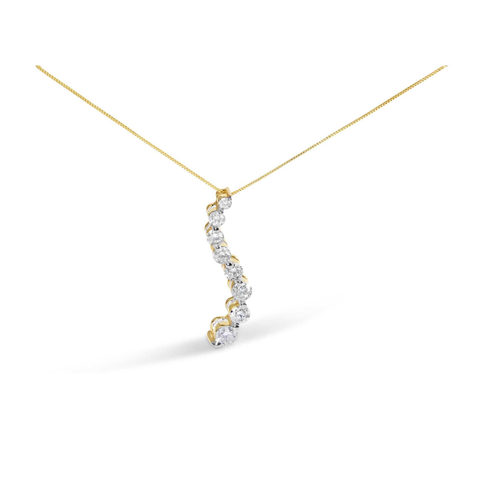 Yellow metal necklace with a curved pendant featuring round prong-set white gemstones, shot from a slight side angle on a white background.
