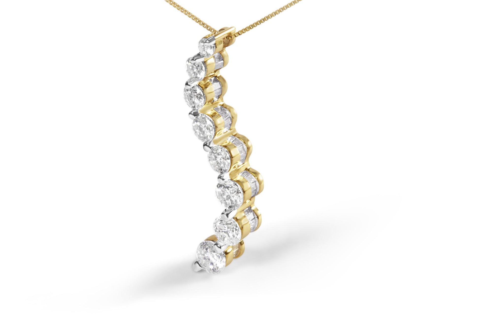 Close-up side angle of a yellow metal necklace pendant with alternating round white gemstones in prong setting and baguette white gemstones in channel setting.