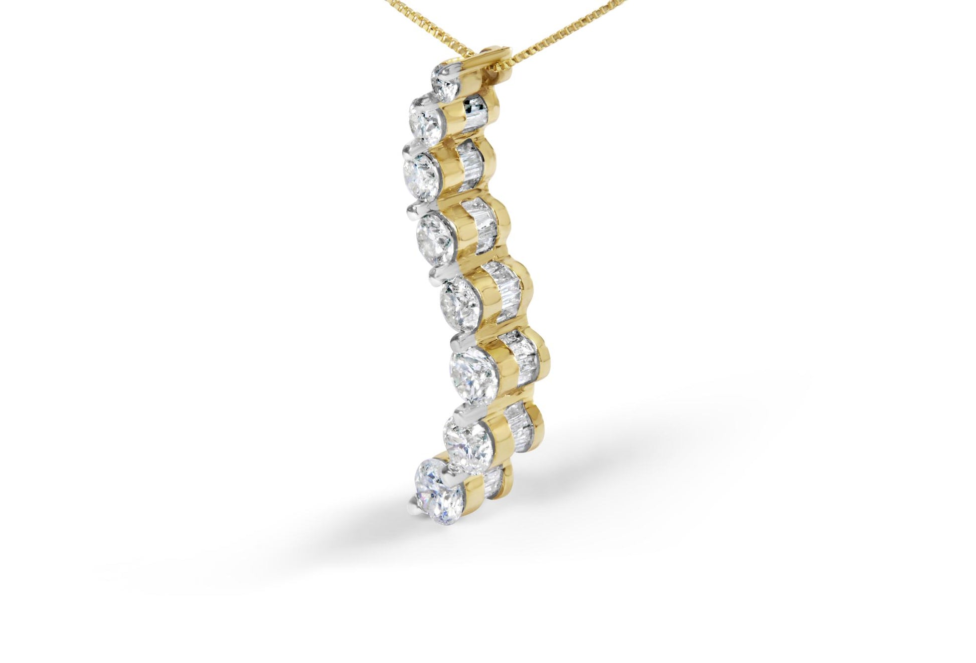 Yellow metal necklace pendant with alternating round prong-set white gemstones and baguette channel-set white gemstones, shown in close-up angled view.
