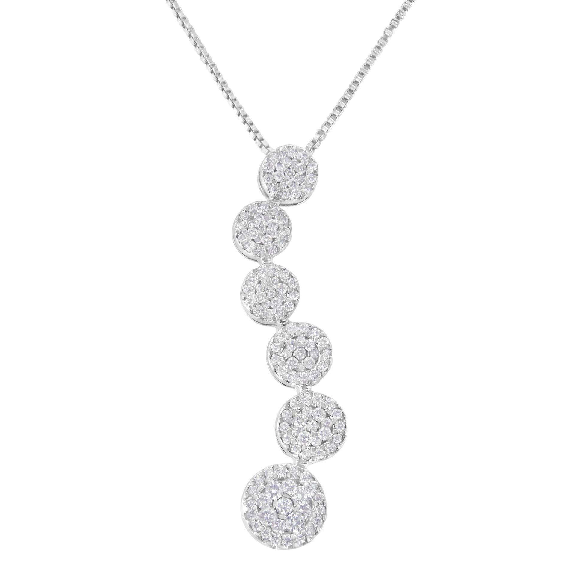 Front angle shot of a white metal necklace featuring a vertical row of round pave-set white gemstones in circular settings.