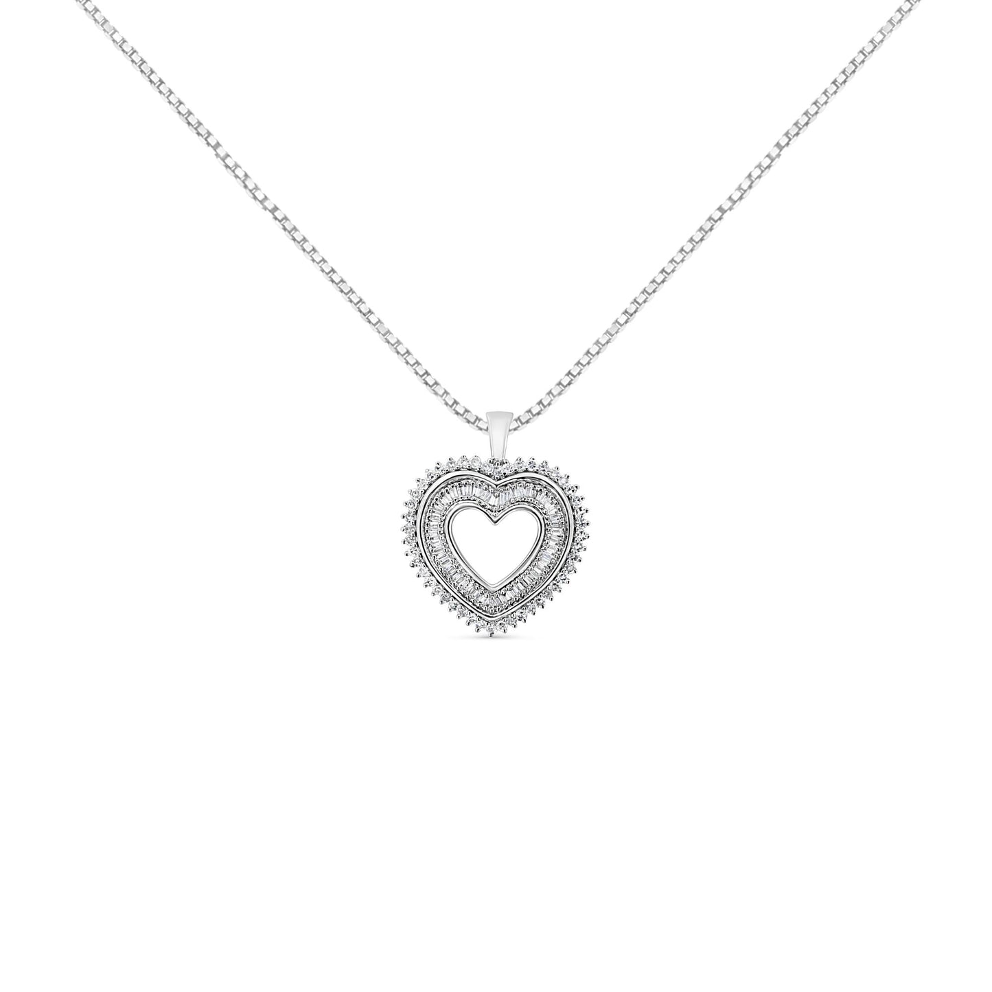 Front-facing shot of a white metal heart-shaped necklace pendant with two rows of prong-set white round and baguette-shaped gemstones, hanging from a chain.