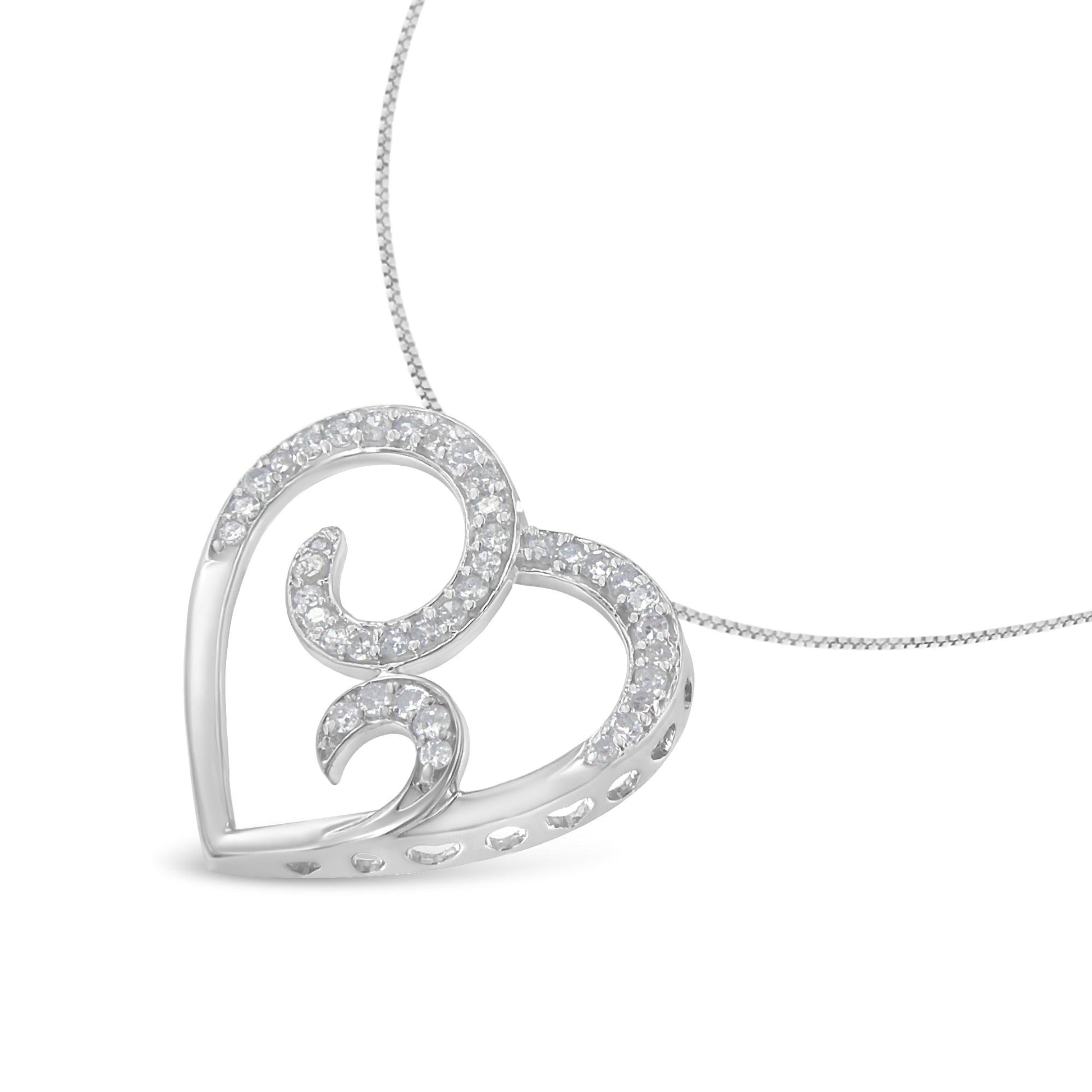 Close-up front angle of a white heart-shaped necklace pendant with swirling design accented with round white gemstones in pave setting.
