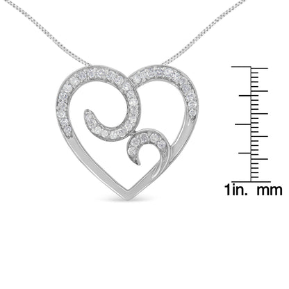 Front view of a white heart-shaped necklace pendant with swirled design featuring round white gemstones in pave setting, shown on a scale for size reference.