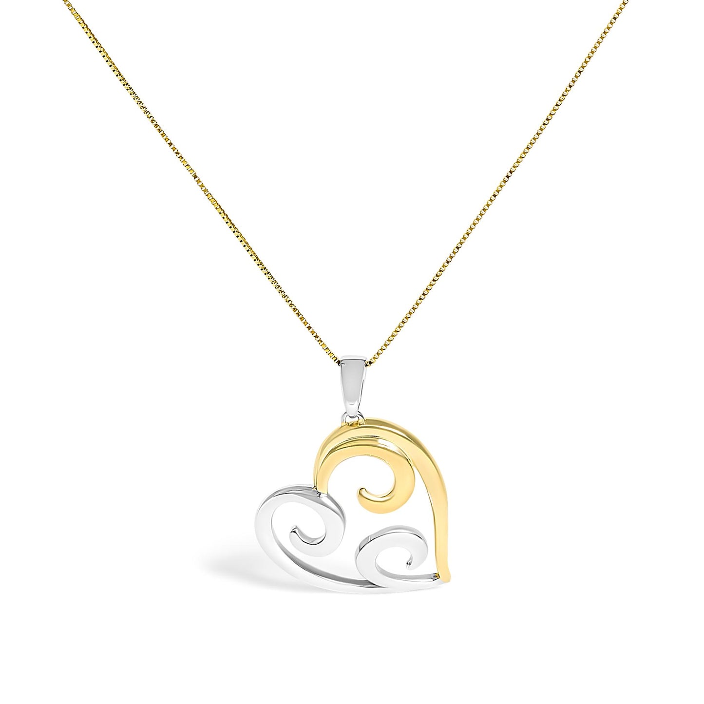 Front-facing shot of a two-toned necklace with a heart-shaped pendant featuring swirling design elements.