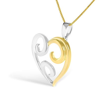 Close-up front angle of a two-toned heart-shaped necklace pendant with swirl design, hanging on a chain.
