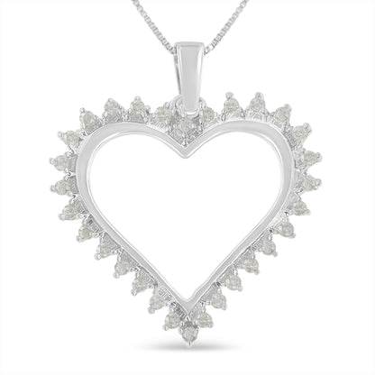 Front view of a white metal heart-shaped necklace pendant with round prong-set white gemstones along the edges.