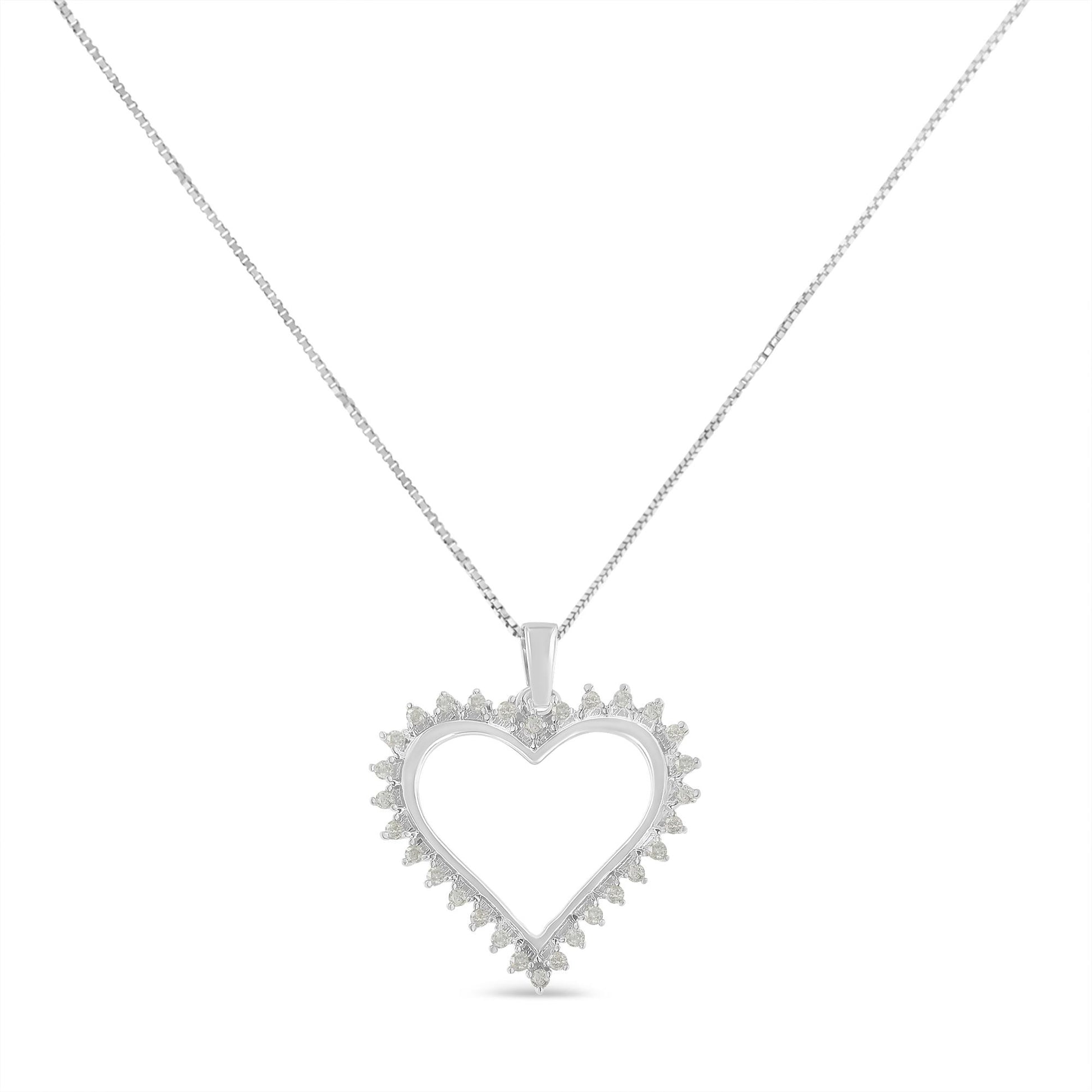 White metal heart-shaped necklace pendant with round prong-set white gemstones around the edge, front-facing angle.