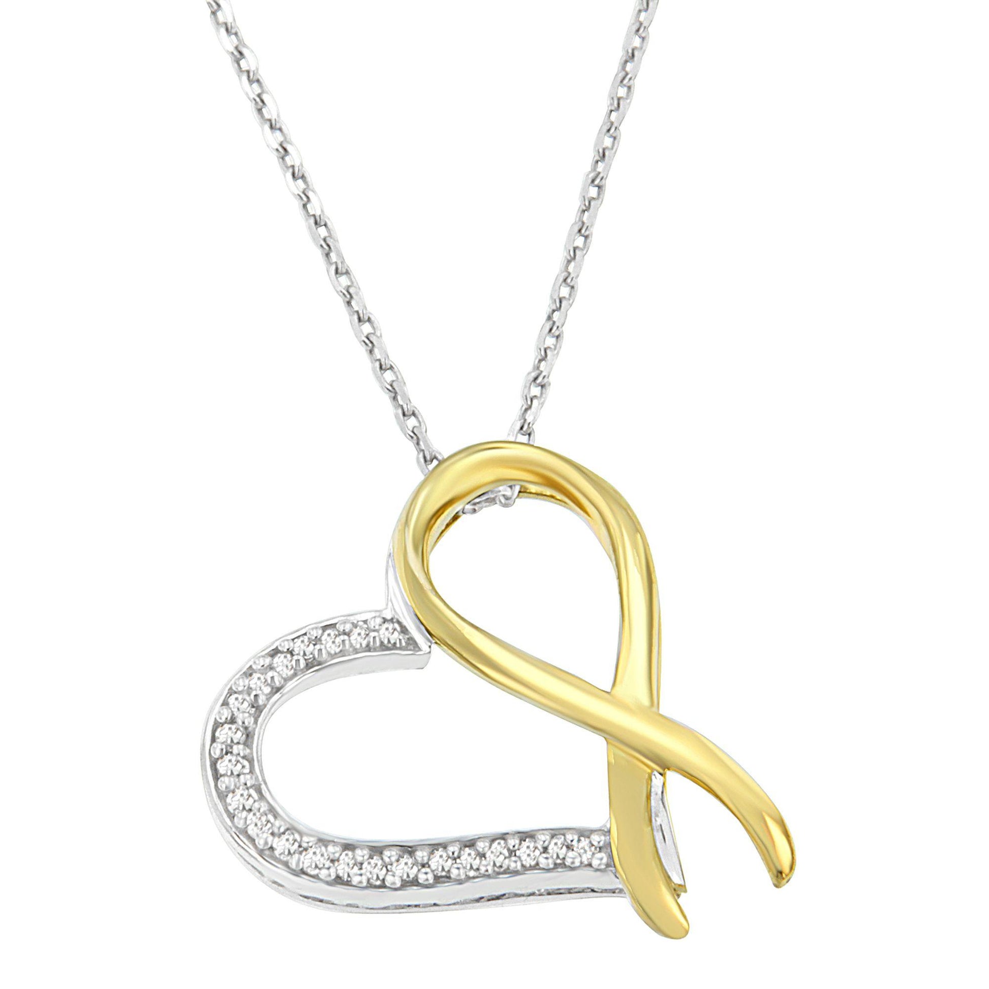 Two-toned necklace with a heart-shaped pendant featuring a gold-toned ribbon loop intertwined with a silver-toned heart outline adorned with small white gemstones, shown in a front-facing view.