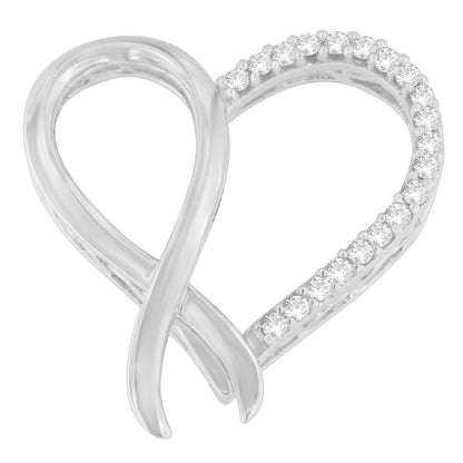 Close-up of a white metal heart-shaped necklace pendant with one side studded with round white gemstones in prong settings, shown from a front angle.