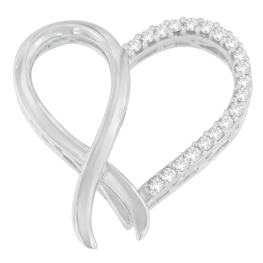 Close-up of a white metal heart-shaped necklace pendant with one side studded with round white gemstones in prong settings, shown from a front angle.