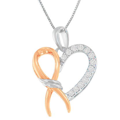 Front angled view of a two-toned necklace pendant featuring an intertwined heart and ribbon design, with one side studded with round white gemstones in prong settings.