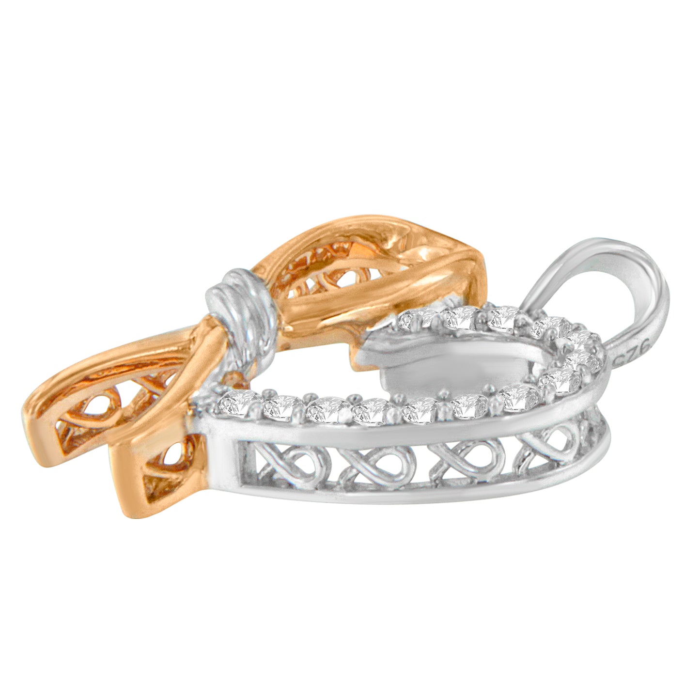 Close-up side angle of a two-toned necklace pendant with a bow design, featuring round white gemstones in prong settings.