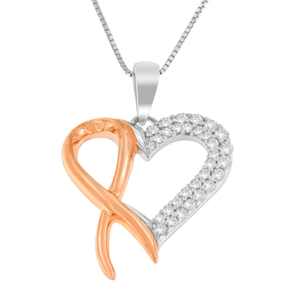 Close-up front view of a heart-shaped necklace pendant with yellow and white metal colors. The right half is adorned with round white gemstones in prong setting, and the left half features a ribbon-like yellow metal design. The pendant hangs from a box chain.
