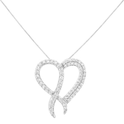 Front-facing close-up of a white metal necklace with a heart-shaped pendant adorned with round white gemstones in prong settings.