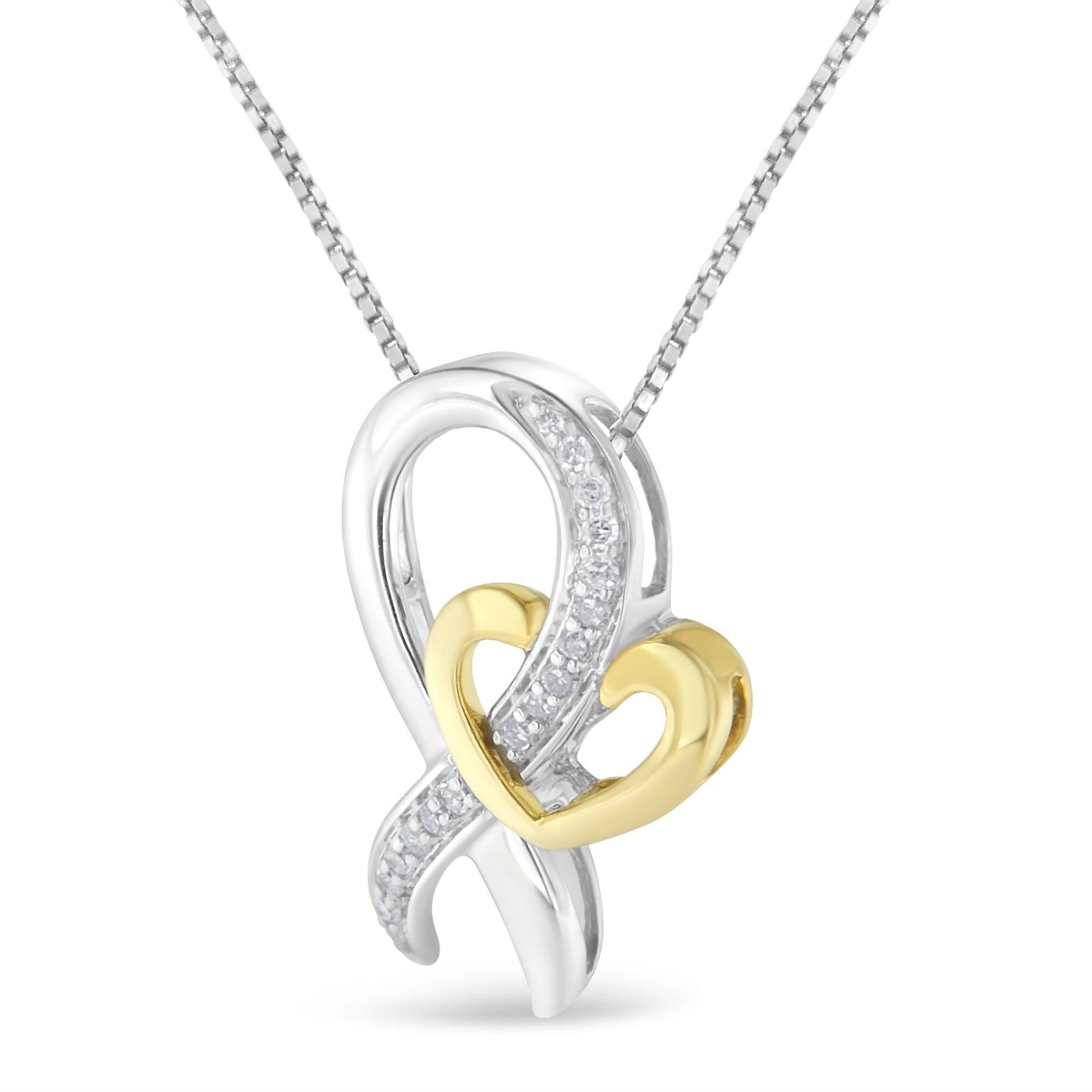 Two-toned necklace pendant with an intertwined design featuring a polished yellow heart and a white curved section accented with round white gemstones, shown from the front angle.
