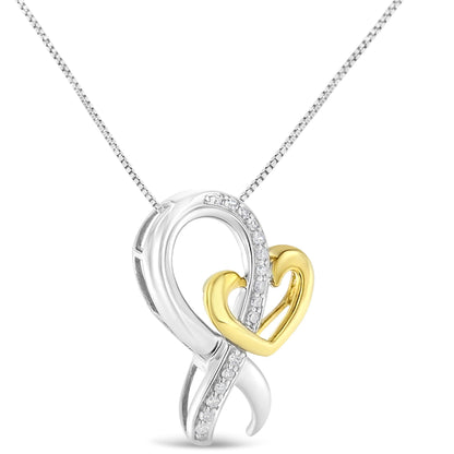 Close-up front view of a two-toned necklace pendant with an intertwined ribbon design featuring white round gemstones in a prong setting and a smooth yellow heart shape.