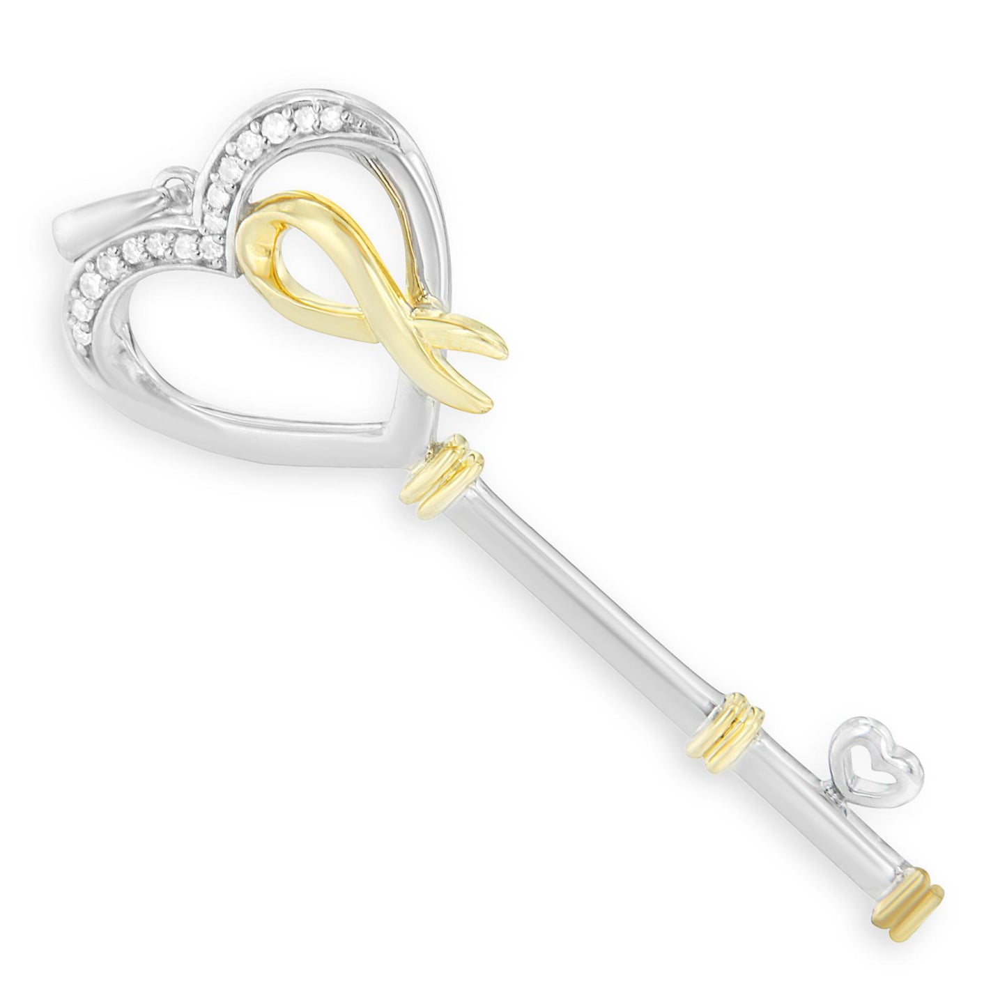 Two-toned key-shaped necklace pendant with heart-shaped top partially set with round white gemstones, shown in a top-down angle.