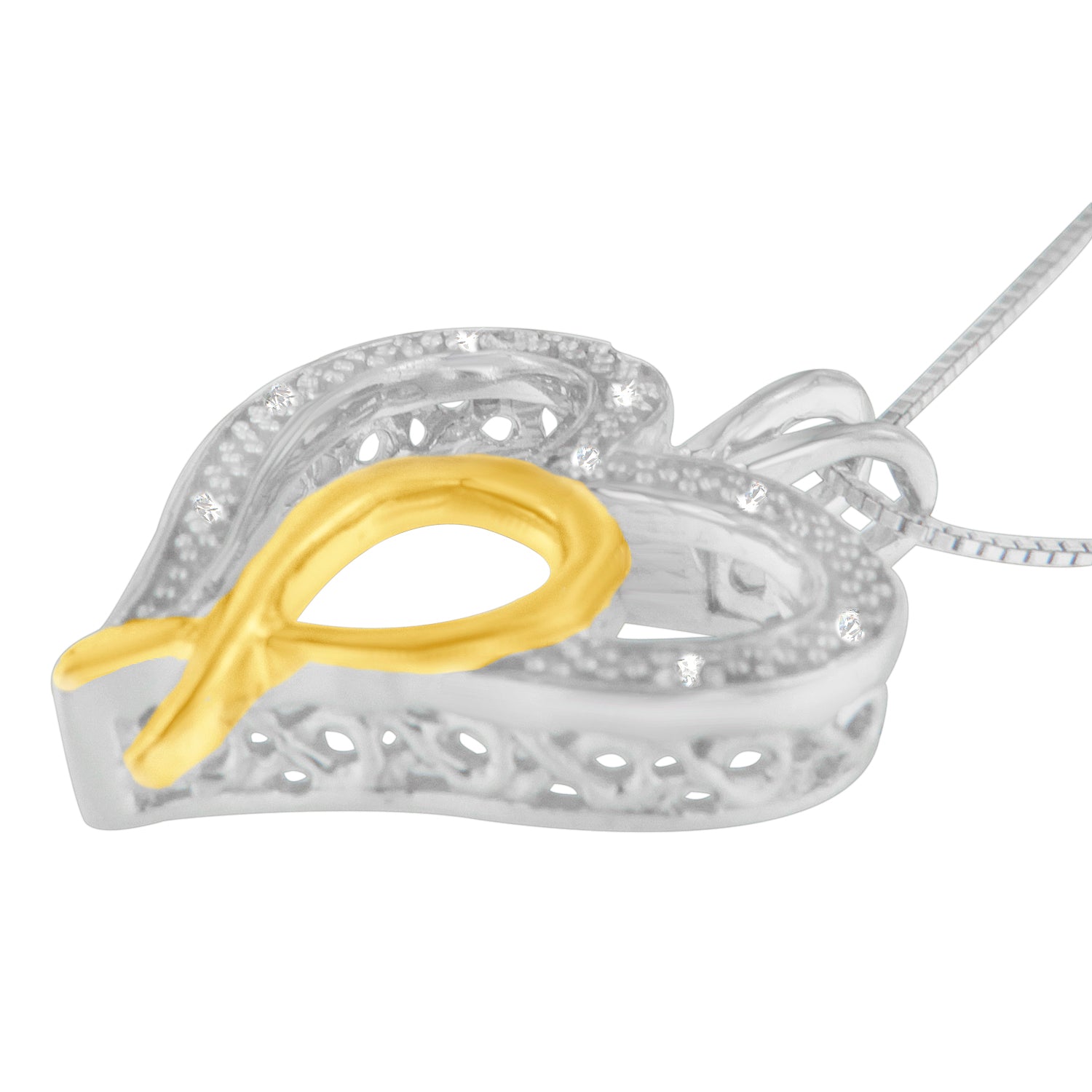 Close-up side angle of a two-toned heart-shaped necklace pendant featuring a raised gold-toned ribbon design and small white round prong-set gemstones along the silver-toned edges.