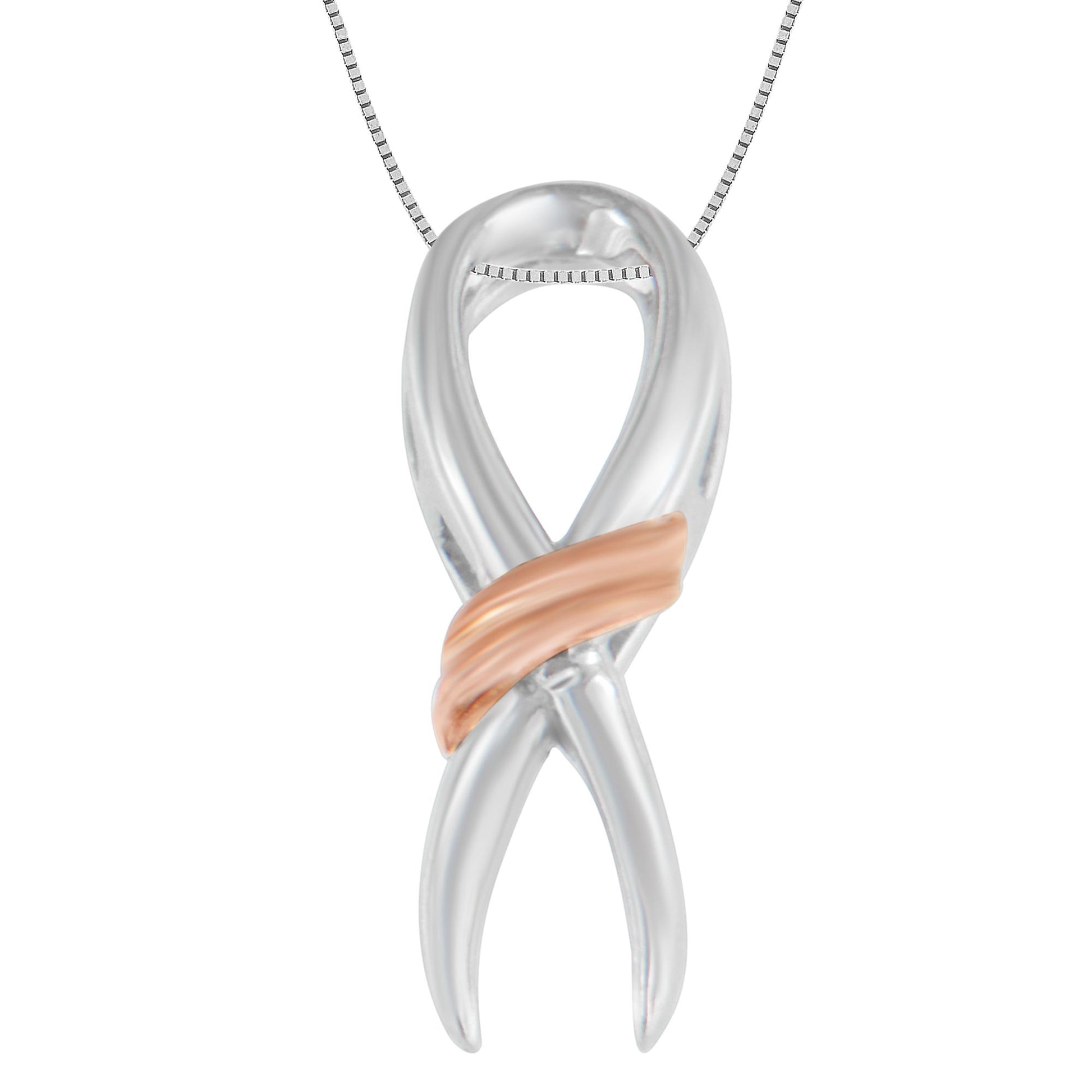 Front view of two-toned metal necklace pendant shaped like an infinity symbol with a diagonal smooth band across the center.