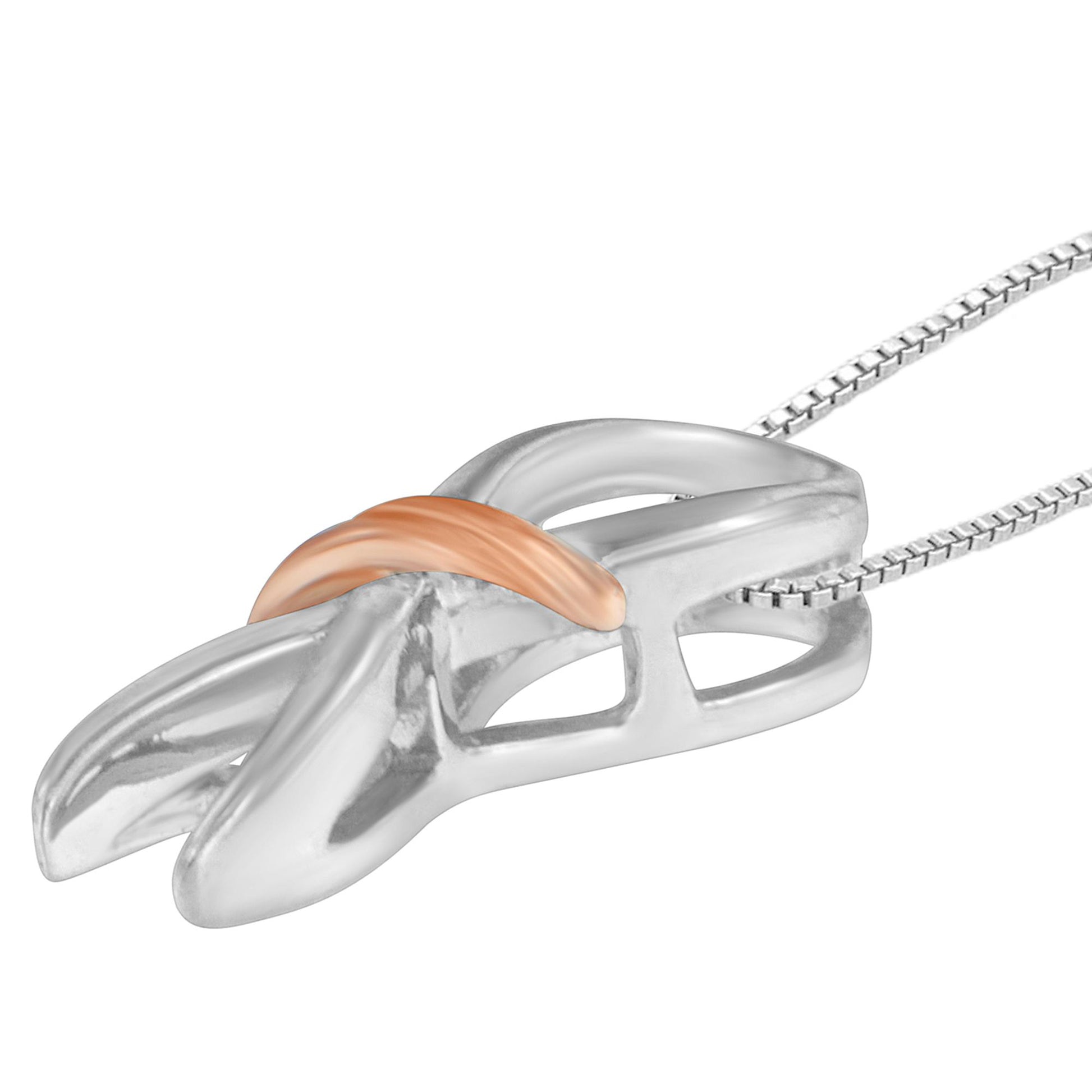 Close-up angled view of a two-toned necklace pendant with an abstract curved design, featuring a polished silver base and a smaller, smooth rose-colored accent piece.