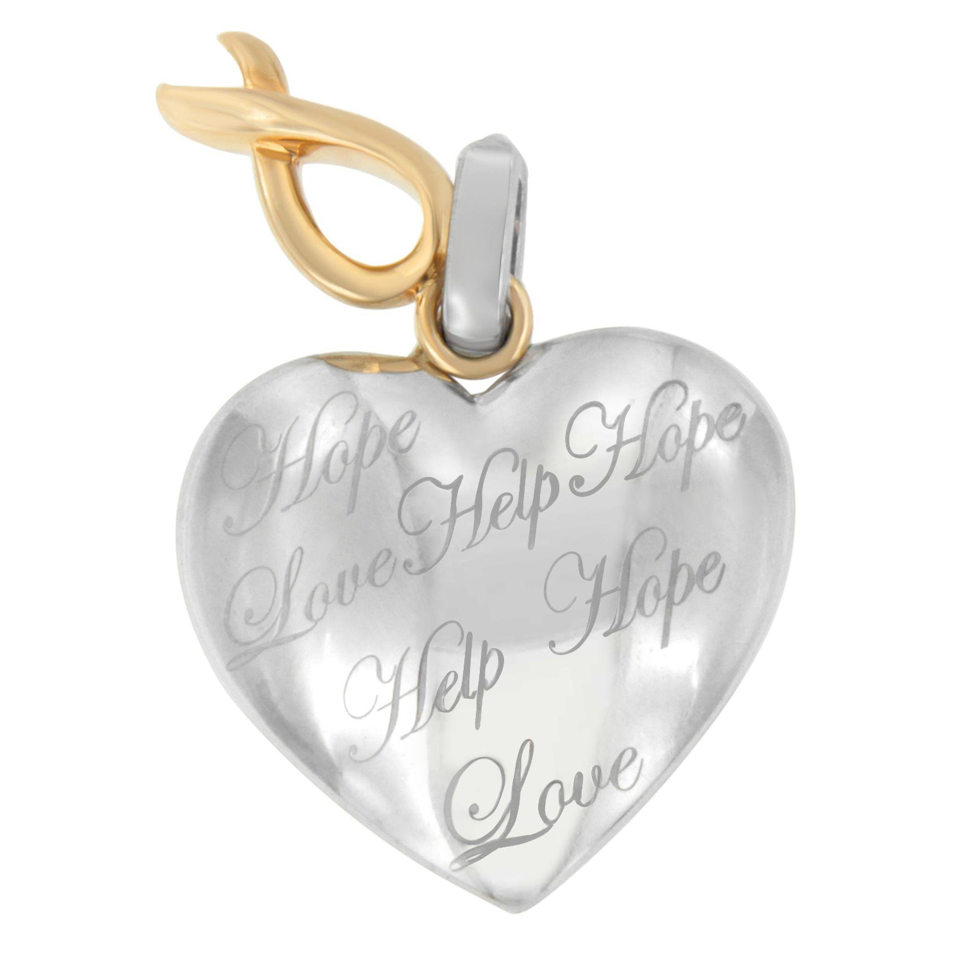 Front-facing close-up of a two-toned heart-shaped necklace pendant with engraved words 'Hope,' 'Help,' and 'Love.'