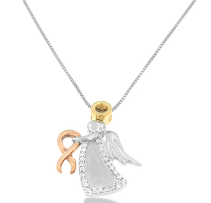 Front view of a tri-toned necklace with an angel pendant holding a ribbon, featuring round white gemstones in prong settings along the edge of the angel's dress.