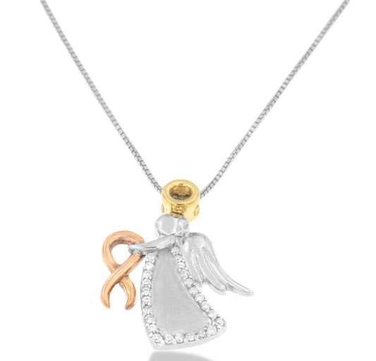Front view of a tri-toned necklace with an angel pendant holding a ribbon, featuring round white gemstones in prong settings along the edge of the angel's dress.
