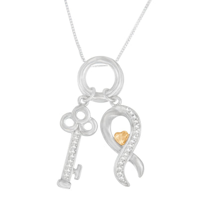 Front view of a dual pendant necklace with a white metal key and an infinity-shaped white metal ribbon accented with white gemstones and a small yellow metal heart, hanging from a white metal chain.