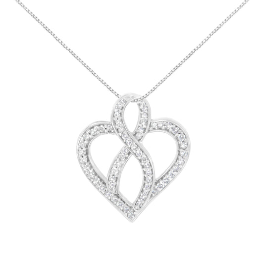 Front view of a white metal heart-shaped necklace pendant adorned with round white gemstones in a prong setting.