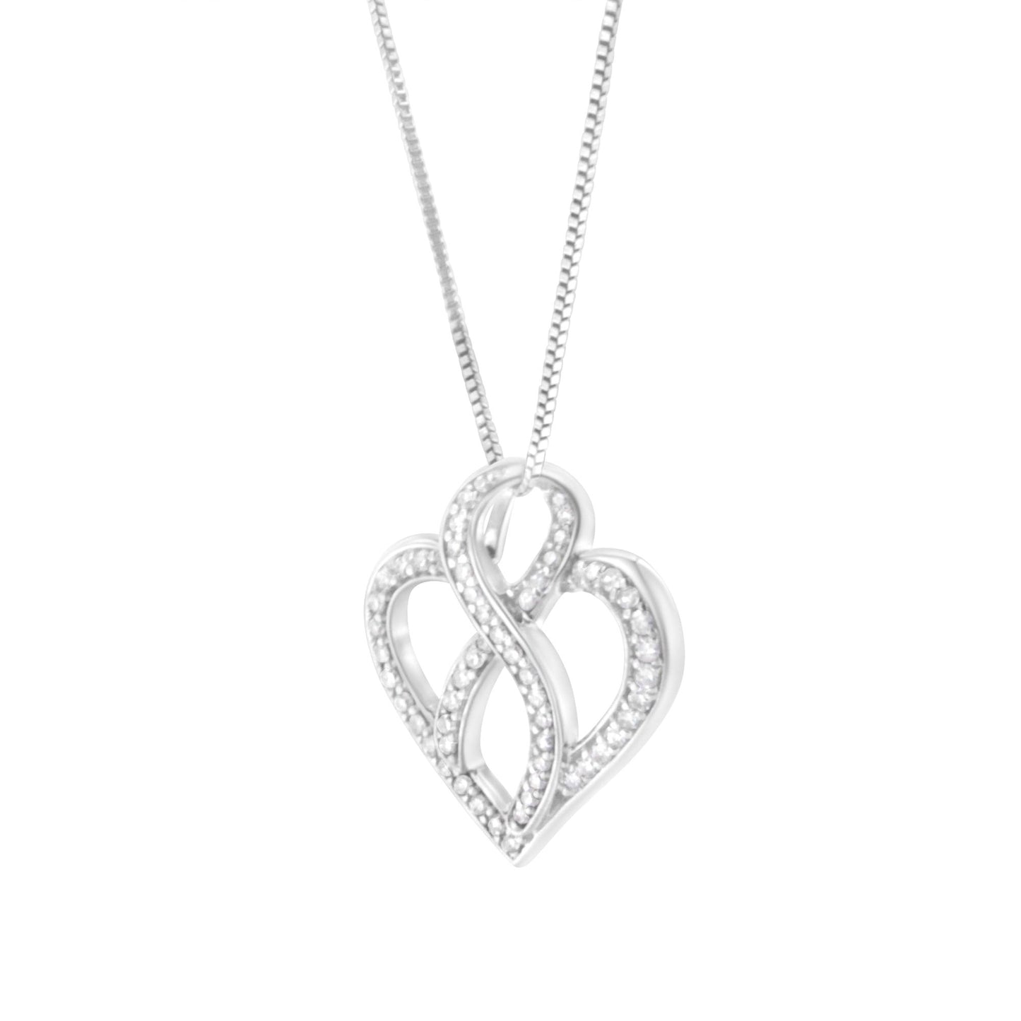 Front-facing shot of a white metal heart-shaped necklace pendant with intertwined design, adorned with multiple round white gemstones in prong settings, hanging from a chain.