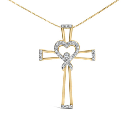 Front view of yellow metal cross necklace pendant with heart shape and round white gemstones in prong setting.