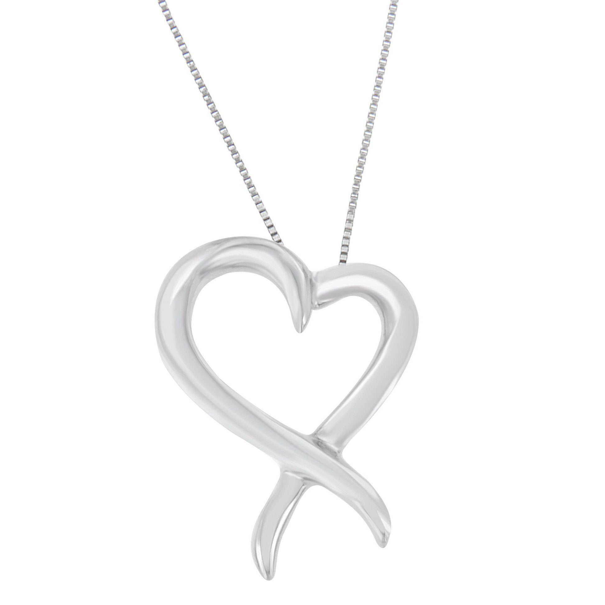 Close-up front view of a white metal necklace with an abstract heart-shaped pendant on a delicate chain.