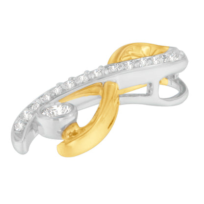 Close-up angled view of a two-tone yellow and white metal necklace pendant featuring a curved design with round white gemstones in prong settings along the top edge and a larger round white gemstone near the bottom.