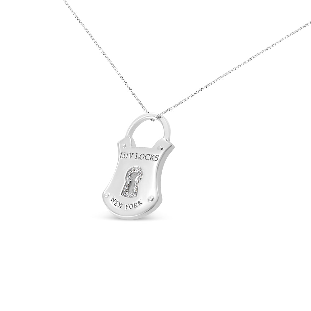 White metal necklace with a padlock-shaped pendant featuring a keyhole accented with round white gemstones in prong settings, photographed at a slight angle on a white background.