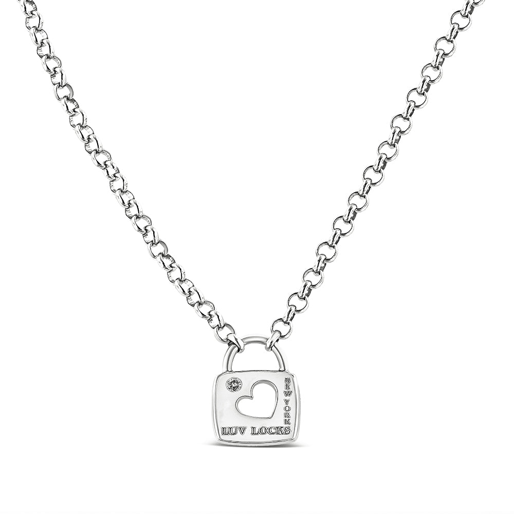 White metal necklace with a heart-shaped cutout pendant featuring a single round white gemstone in a bezel setting, front view.