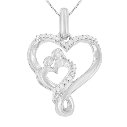 Front view of white metal heart-shaped necklace pendant with two smaller integrated heart shapes accented with small white gemstones.