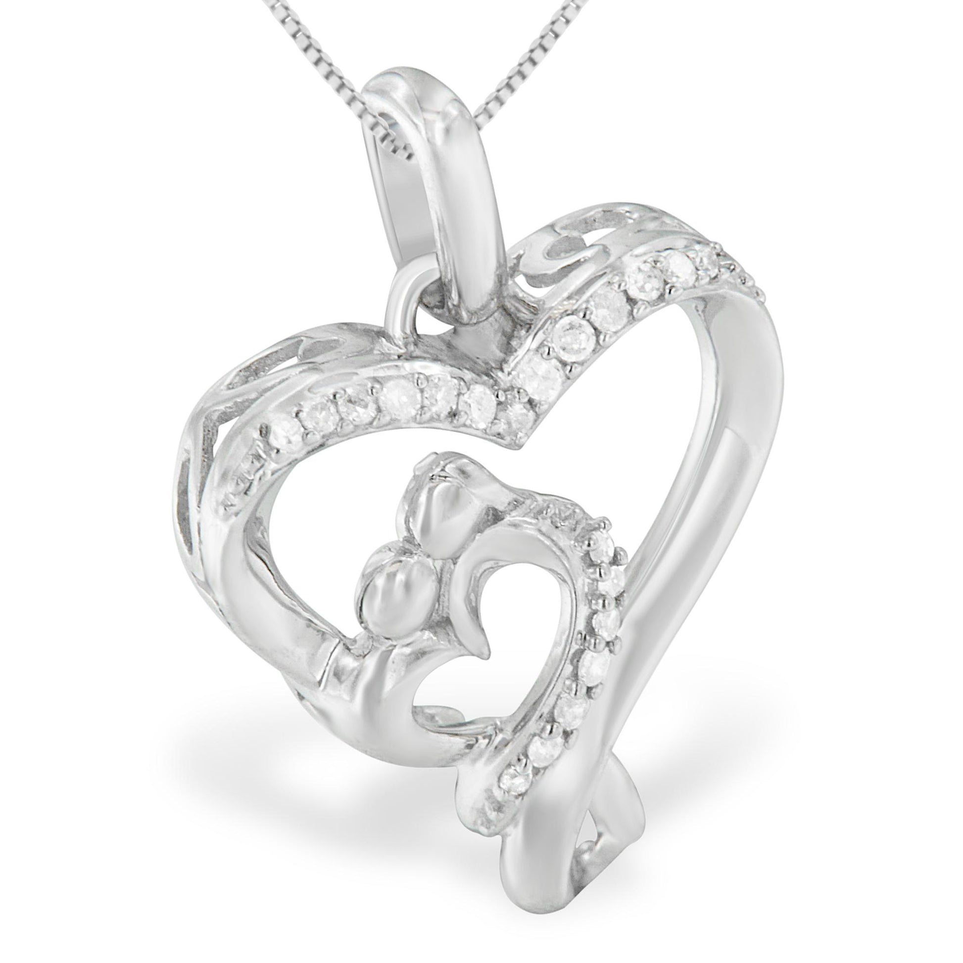 Close-up front angled view of a white metal heart-shaped necklace pendant with multiple small round white gemstones in prong settings along the outer and inner edges.
