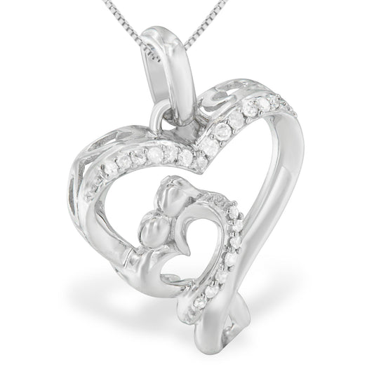 Close-up front angled view of a white metal heart-shaped necklace pendant with multiple small round white gemstones in prong settings along the outer and inner edges.