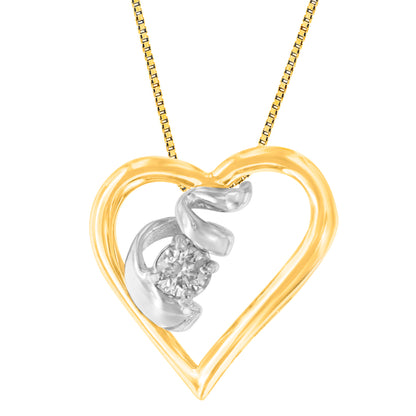 Front view of a yellow and white metal heart-shaped necklace pendant with a single round white gemstone in prong setting.