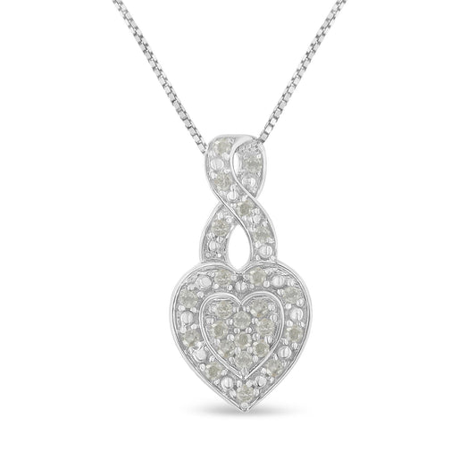 Front view of a white metal necklace with a pendant featuring an infinity loop above a heart shape, both adorned with round white gemstones in a pave setting.
