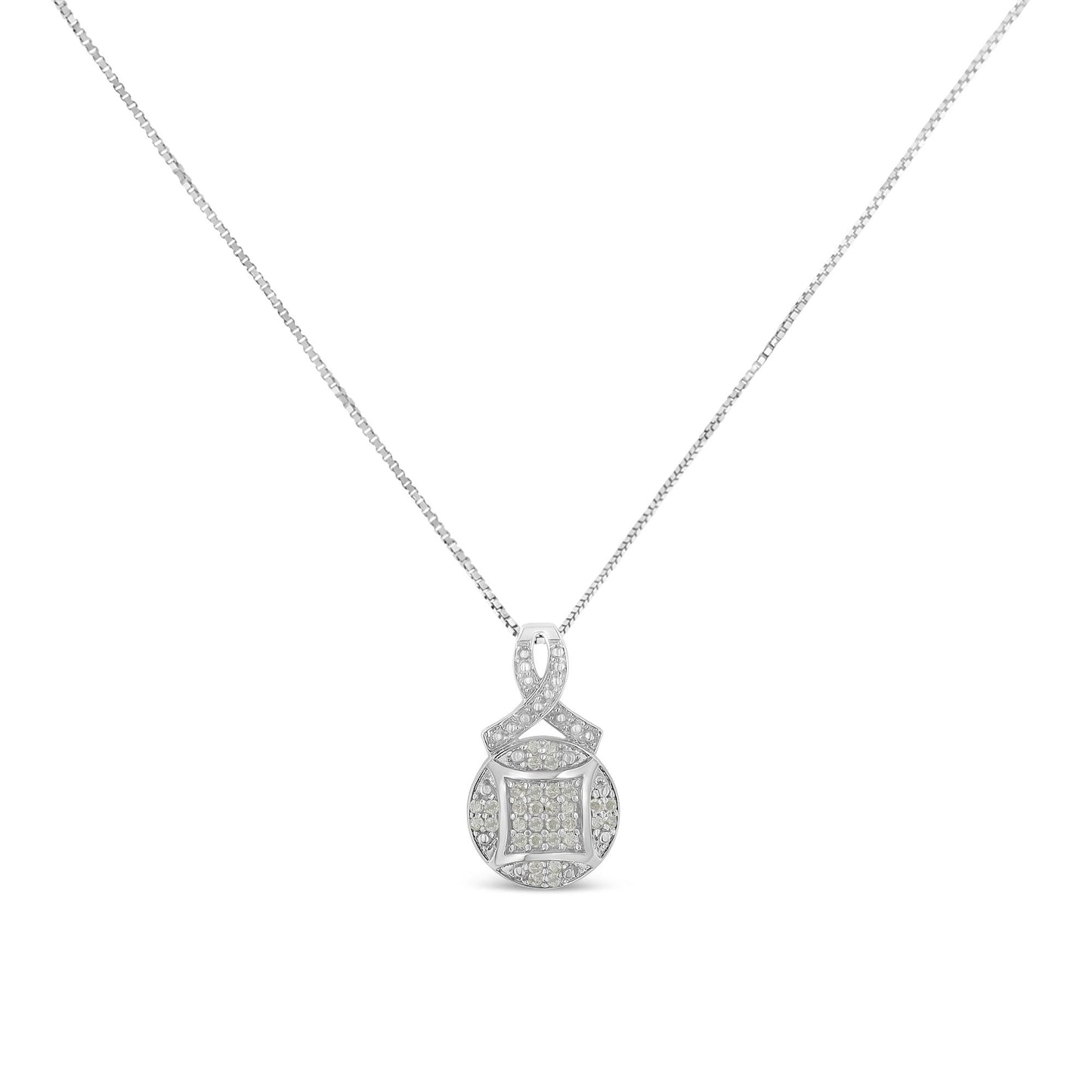 Front view of a white metal necklace with a round pendant featuring an intricate design set with white round pave-set gemstones.